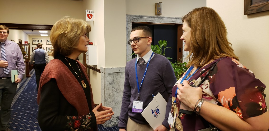 Volunteers Joe Yourkoski and Johna Beech talking with U.S. Senator Lisa Murkowski in the Alaska State Capitol - February 19, 2019